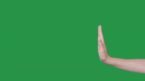 Hand Making Stop Gesture on Green Screen