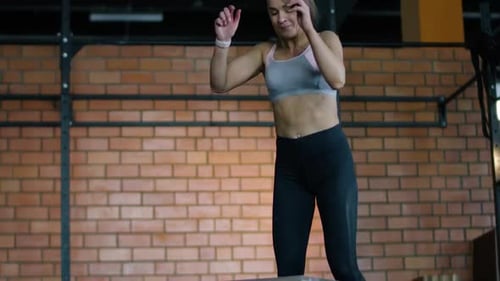 Young Sports Woman Jumping on Wooden Boxes Coordination Training Crossfit Training Day in the Gym
