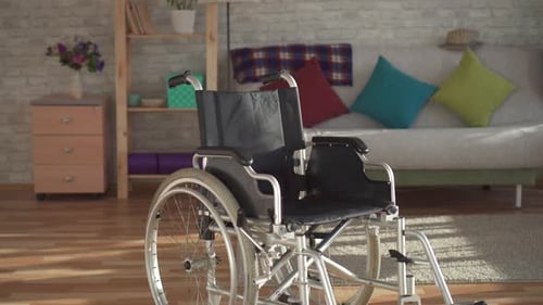 Empty Wheelchair in Living Room