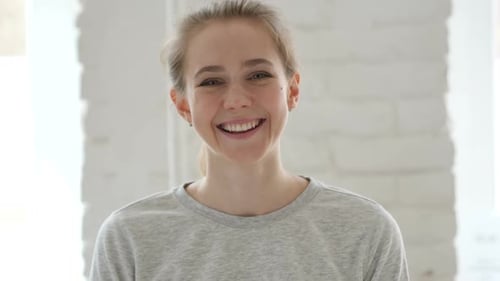 Smiling Woman Looking at the Camera