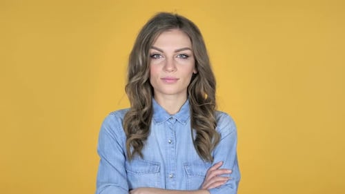 Confident Young Woman in Denim Shirt Posing