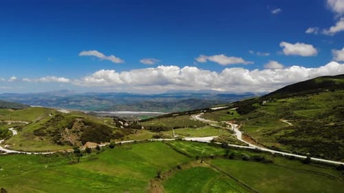 Scenic Green Hills and Mountains Aerial Landscape
