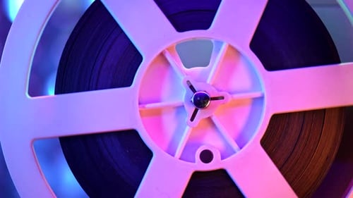 Retro Reel with Film Rotating on Sequins Kinetic Wall Colorful Light