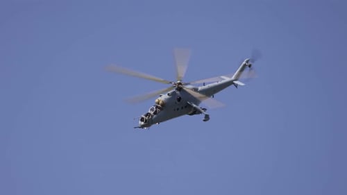 Military Helicopter Flying on a Clear Day