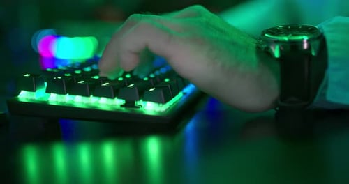 Man Presses the Keyboard Keys with His Fingers