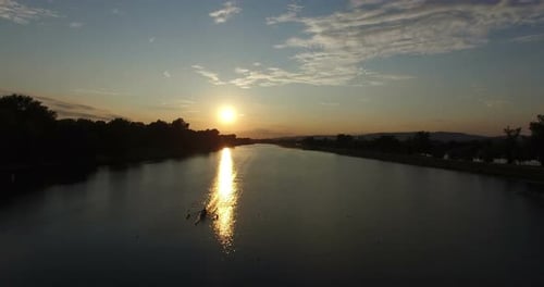 Rowing boat on Jarun lake at sunset
