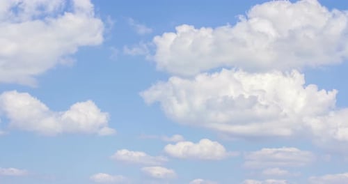Clouds Drifting Across a Blue Sky Time-Lapse