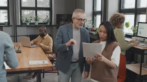 Employees Talking to Boss