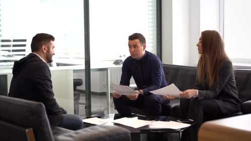 Three Young Adults Have Corporate Meeting