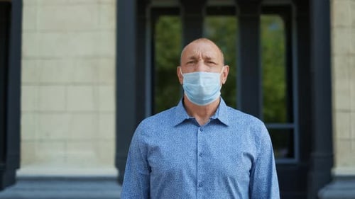 Man Wearing Surgical Mask Outdoors