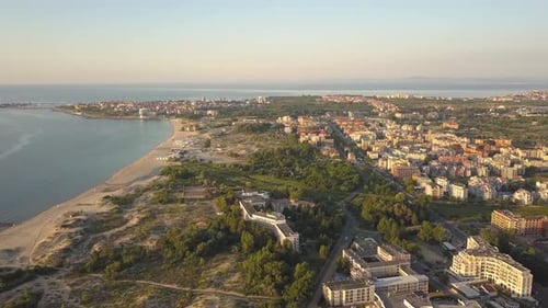Aerial view of Sunny Beach city that is located on Black Sea shore. Top view of sand beaches with