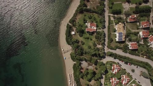 - Aerial Shot of Resort Town with Cottages on Sea Coast, Greece