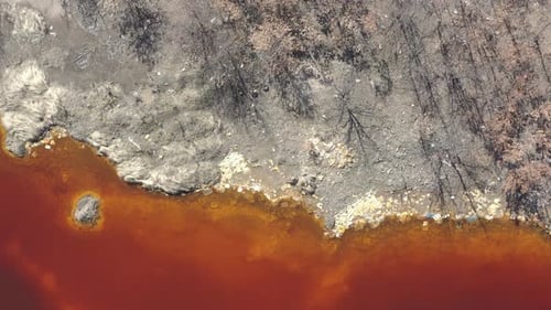 Red acid mine drainage water from above 4K drone footage