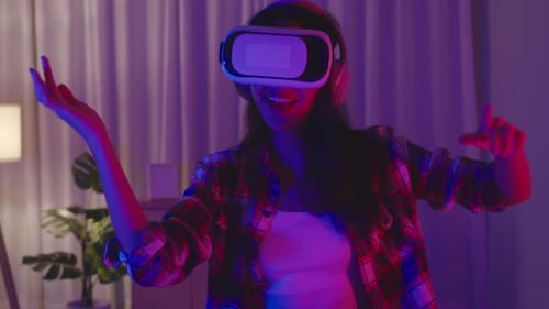 Woman Enjoys Virtual Reality in Neon Room