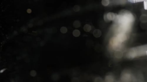 Abstract Black Background with Blurred Light Effects