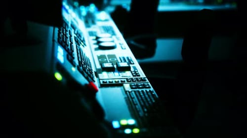 Futuristic Control Panel Interface with Glowing Buttons and Displays