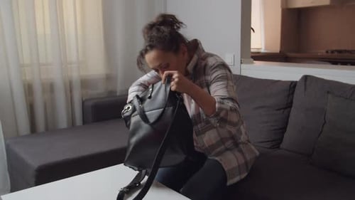 Adult Woman Dropping All Stuff Out From Bag Searching Some Lost Thing
