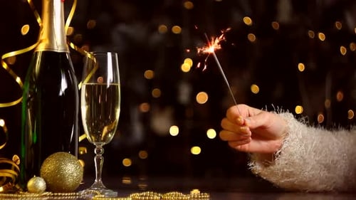 Celebratory Sparkler with Champagne at a Home Party