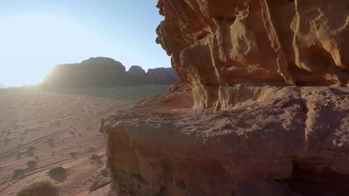Aerial View of Red Rock Cliff in Desert