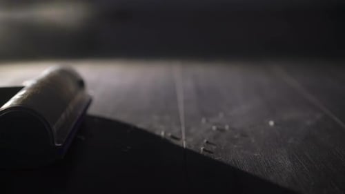 Vacuum Cleaner Head Cleaning Dark Wood Floor