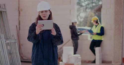 Confident Young Female Architect on Video Call