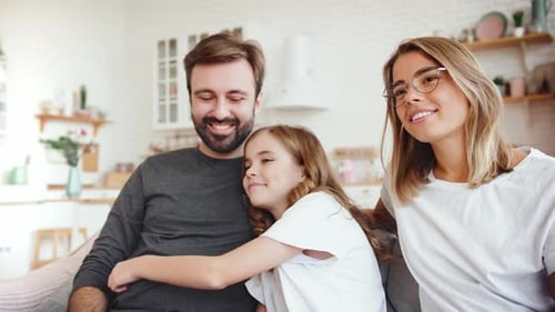 Happy Family Relaxing Together at Home