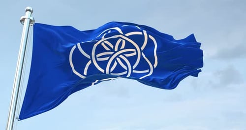 International Flag of Earth Symbol Waving in Blue Sky