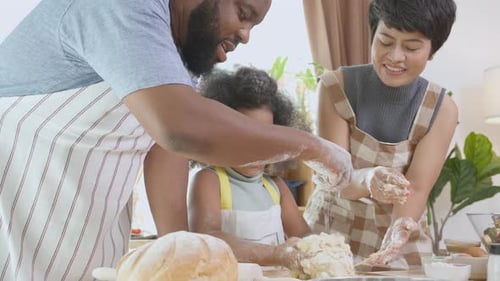 Family Baking Together in a Bright Kitchen