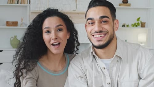 Web Cam View Portrait Close Up Male and Female Face Online Conversation Spanish Man Curly Ethnic