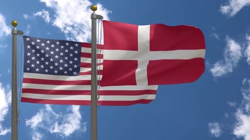 United States and Denmark Flags Waving in the Wind