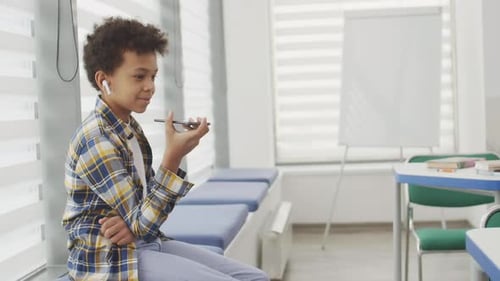 African School Boy Using Gadgets