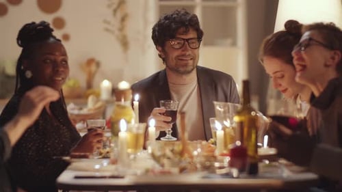 Friends Gathering at a Festive Dinner Party