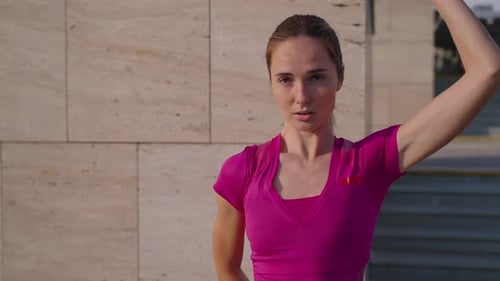 Woman Stretching Arms Before Fitness Workout