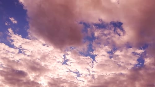 Majestic Pink Clouds Moving Across the Sky