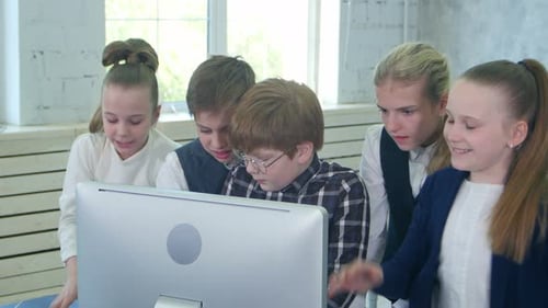 Business Children Team Working Together on Laptop in Office