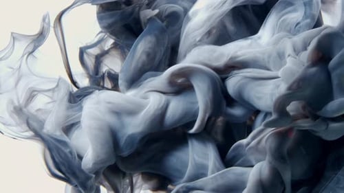 Dark Blue and Gray Ink Plumes in Liquid