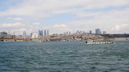 Panoramic View Boat Sailing Along Bosphorus Strait on Modern Architecture Background of Istanbul