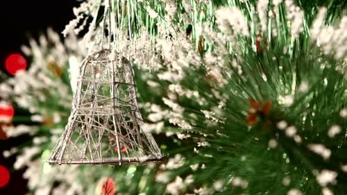Decoration - a Toy Silver Bell on Christmas Tree, Bokeh, Light, Black, Garland, Cam Moves To the