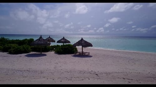 Aerial drone view scenery of beautiful coastline beach journey by shallow ocean and white sandy back