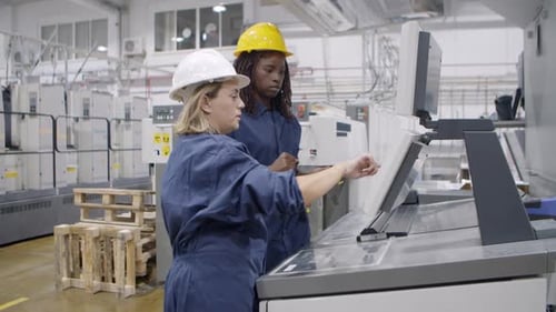 Middle Aged Female Factory Worker Taking Proficiency Exam