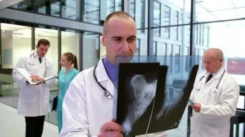 Doctors and Staff Working at Modern Hospital