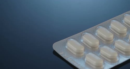 Blister Pack of Pills on Reflective Surface