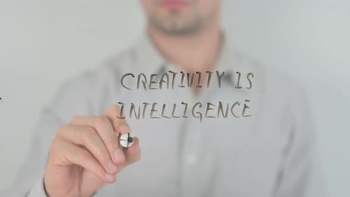 Creativity Is Intelligence Having Fun Writing on Screen with Hand
