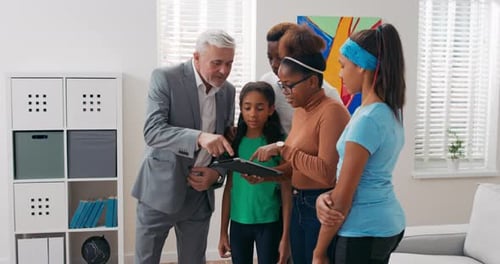 Inspection with Real Estate Agent of New Apartment in City Center Couple with Children Decide to Buy