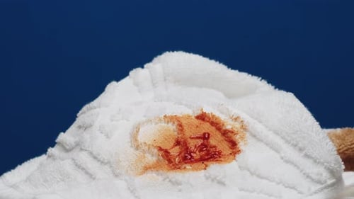 Close Up of White Towel with Stain