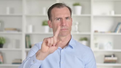 Man Making a No Gesture