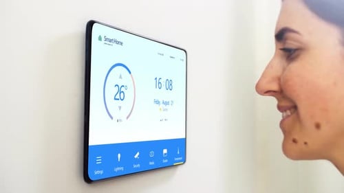 Woman Using Smart Home Digital Device