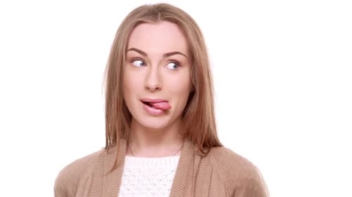 Woman Making Silly Faces on White Background