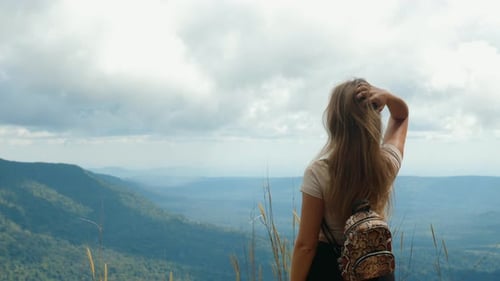 Woman Overlooking Mountain Vista