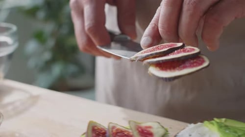 Preparing Delicious Fig and Avocado Toast at Home
